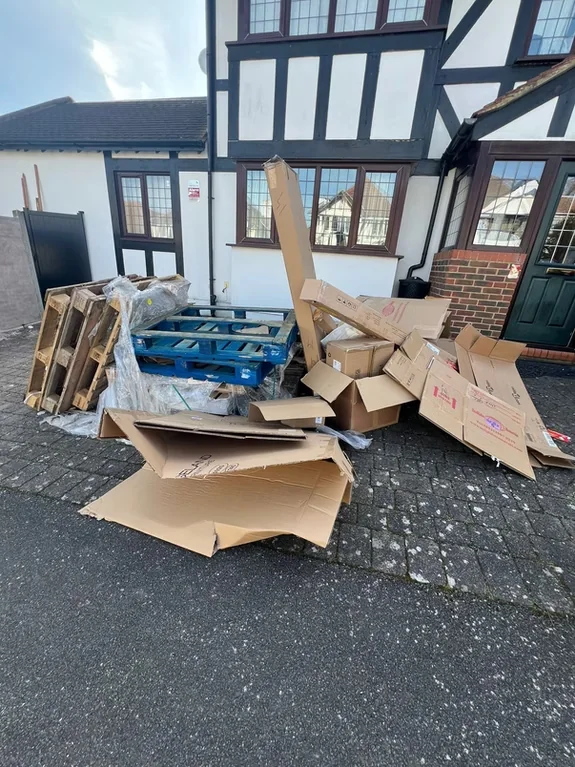 Driveway cardboard and mixed waste before collection