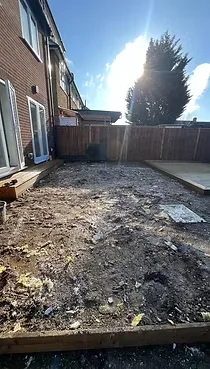 Garden clearance area before waste removal