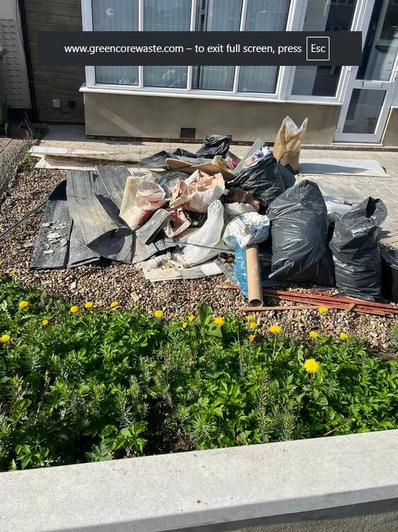Garden and builders waste before rubbish removal