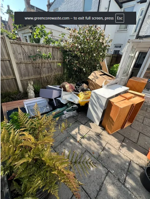 Patio area with rubbish before GreenCore Waste collection